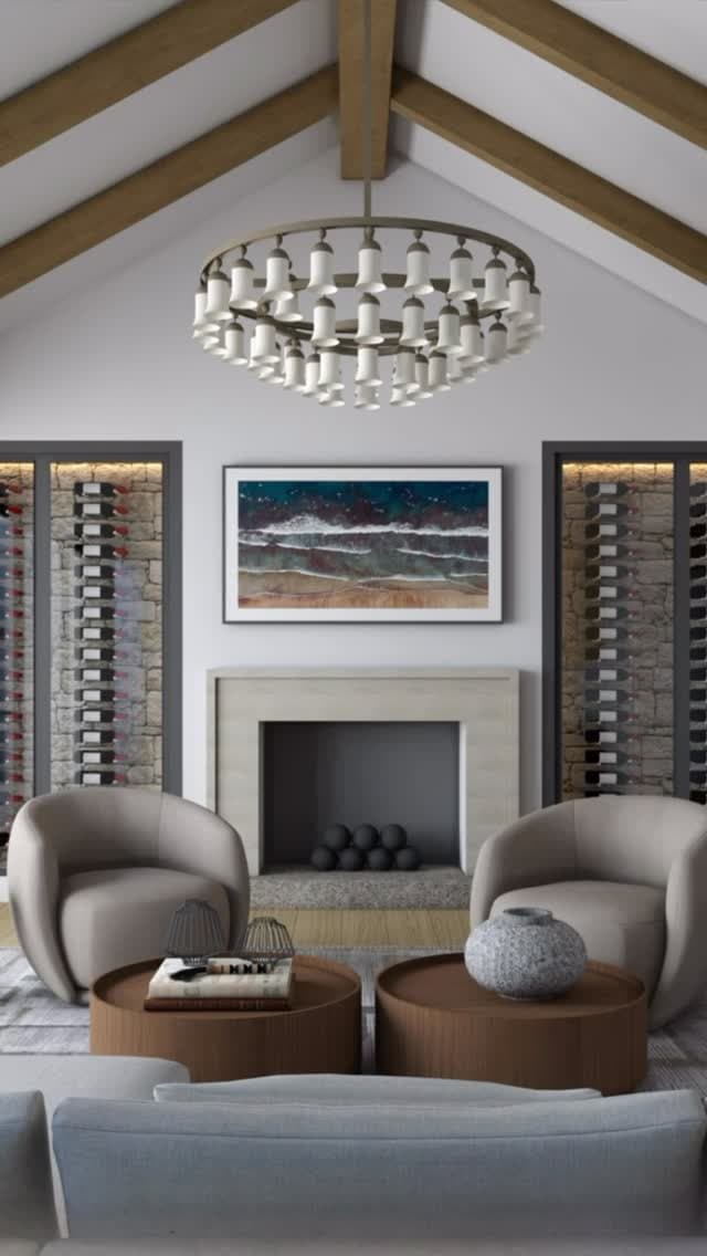 A vaulted living room with exposed beams, a stone fireplace and flanking climate-controlled wine walls.